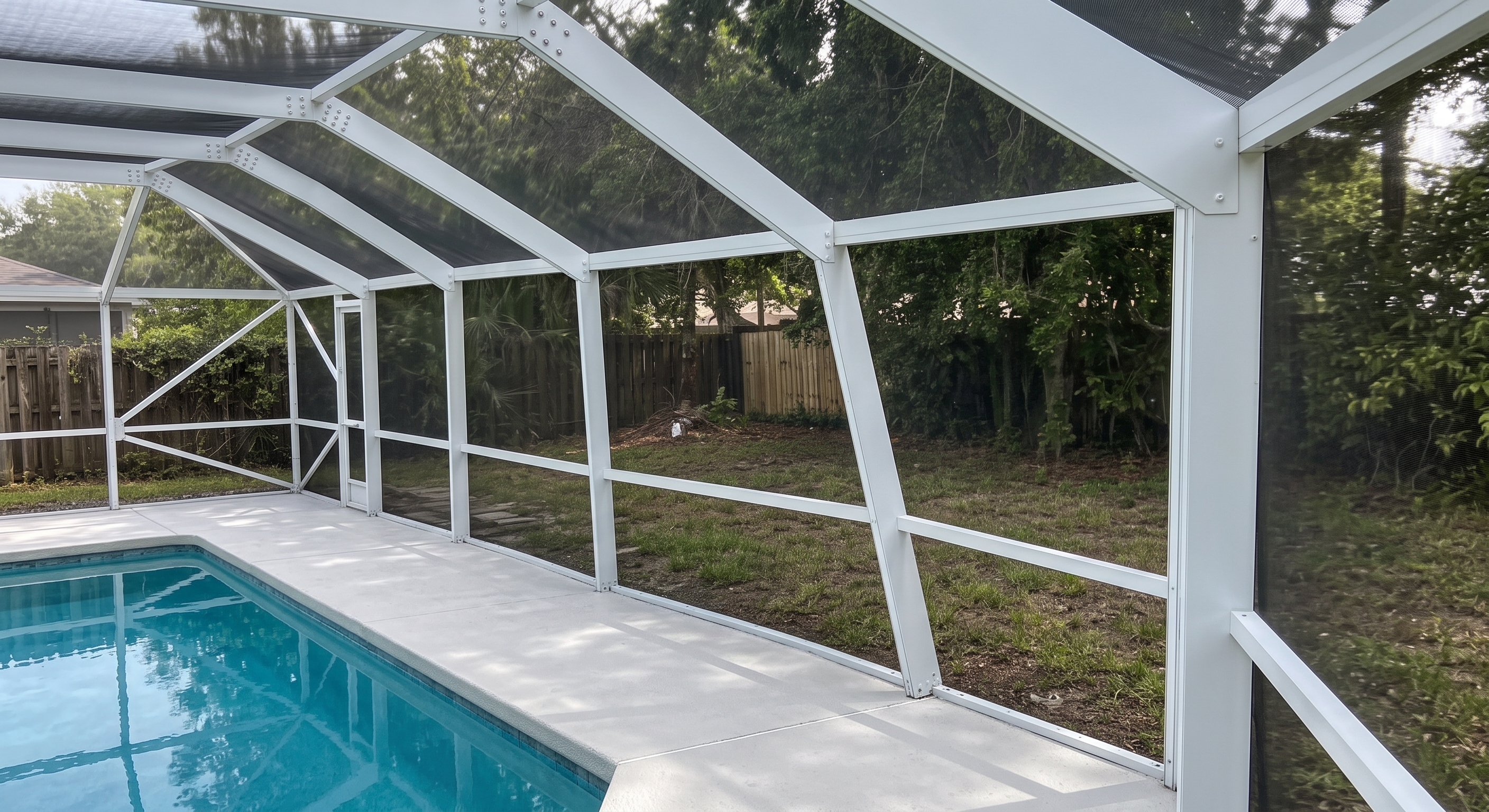 Restored pool cage with fresh paint and new tight screens